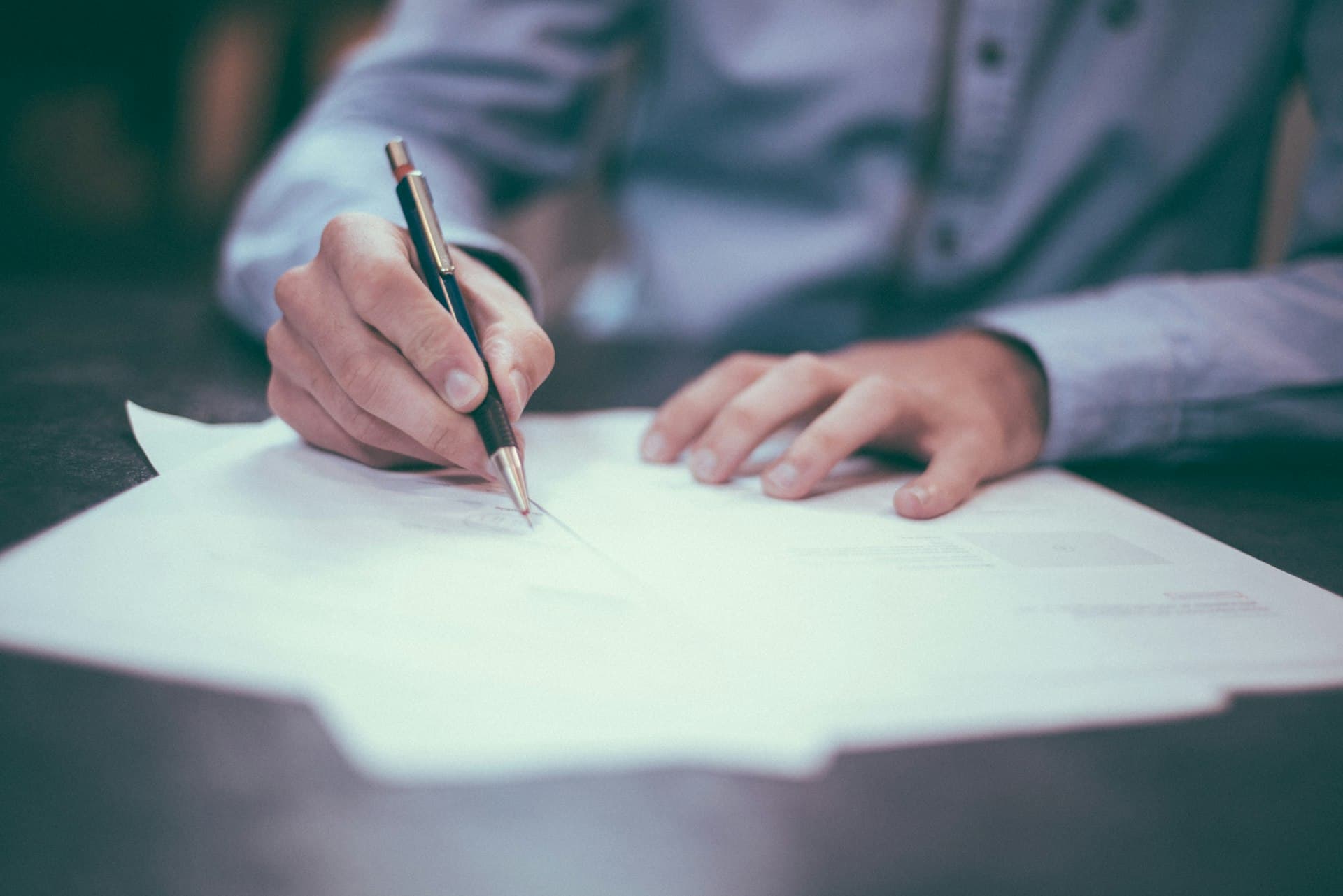 Insurance documents and planning on a desk